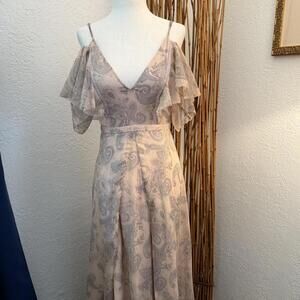 Pink and grey romantic floor length dress with a boho touch